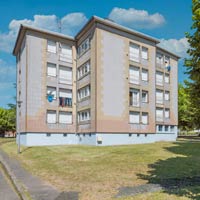 Programme LEN dans le quartier Saint-Laurent à Cosne-Cours-sur-Loire (Nièvre) : la façade sud d'un des immeubles LEN.